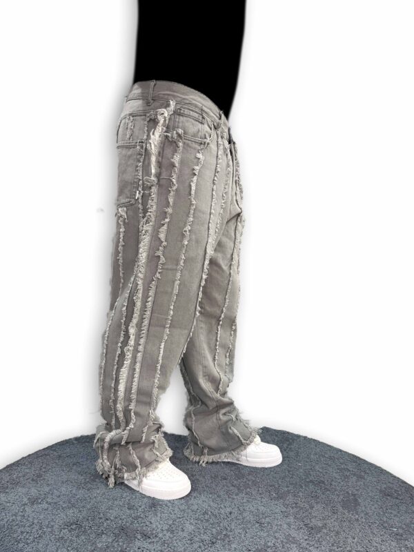 Jeans strappati con filetto - immagine 3